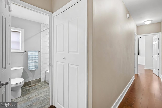 154 Mercy St, Philadelphia, PA 19148 - hall with dark wood-style floors and baseboards