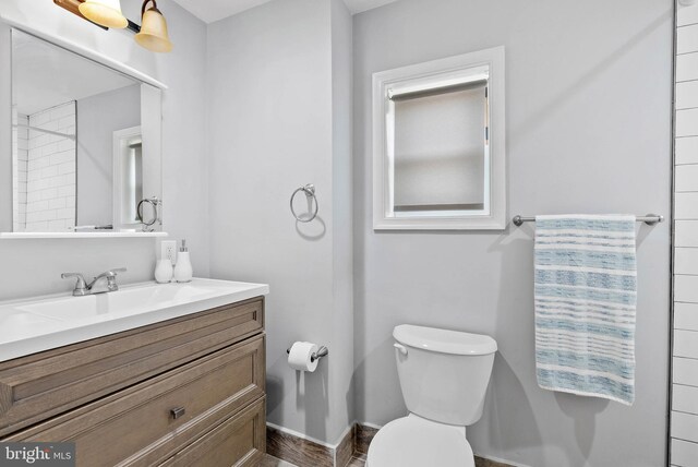 154 Mercy St, Philadelphia, PA 19148 - bathroom with toilet, vanity, and baseboards
