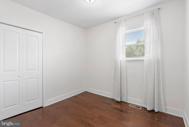 154 Mercy St, Philadelphia, PA 19148 - spare room with dark wood-style flooring and baseboards