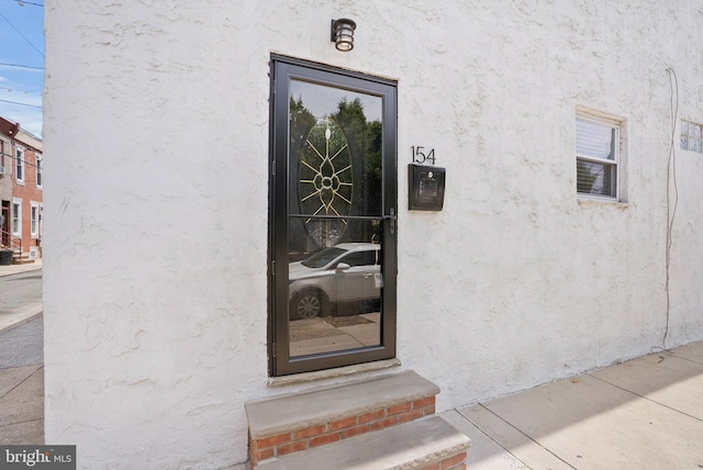 154 Mercy St, Philadelphia, PA 19148 - view of exterior entry with stucco siding
