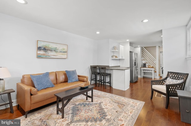 154 Mercy St, Philadelphia, PA 19148 - living room featuring dark wood-style floors, recessed lighting, and stairway
