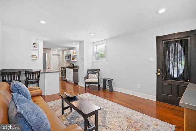 154 Mercy St, Philadelphia, PA 19148 - living area featuring wood finished floors, recessed lighting, and baseboards