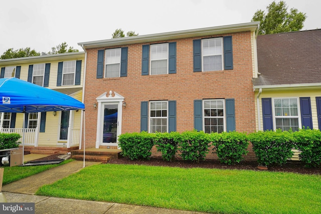 1004 Limestone Ct, Salisbury, MD 21804 - view of front of home featuring a front lawn and brick siding