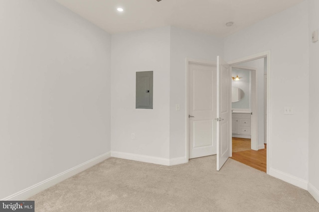 1391 Pennsylvania Ave SE Unit 348, Washington, DC 20003 - spare room featuring electric panel, carpet flooring, and baseboards