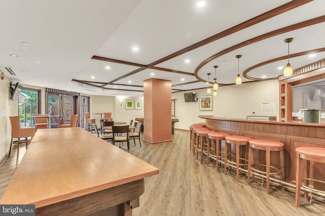 1391 Pennsylvania Ave SE Unit 348, Washington, DC 20003 - community bar area featuring light wood finished floors, recessed lighting, baseboards, and decorative light fixtures