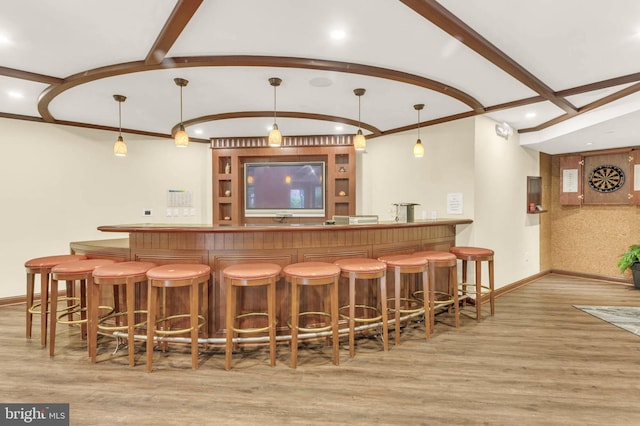 1391 Pennsylvania Ave SE Unit 348, Washington, DC 20003 - indoor wet bar featuring wood finished floors, baseboards, pendant lighting, beam ceiling, and recessed lighting