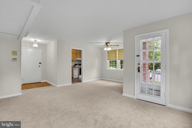 6517 Potomac Ave Unit A2, Alexandria, VA 22307 - unfurnished living room featuring carpet, baseboards, and ceiling fan