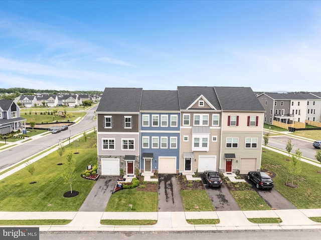 113 Heyford Dr, Stephenson, VA 22656 - multi unit property featuring a garage, driveway, a residential view, and a front lawn