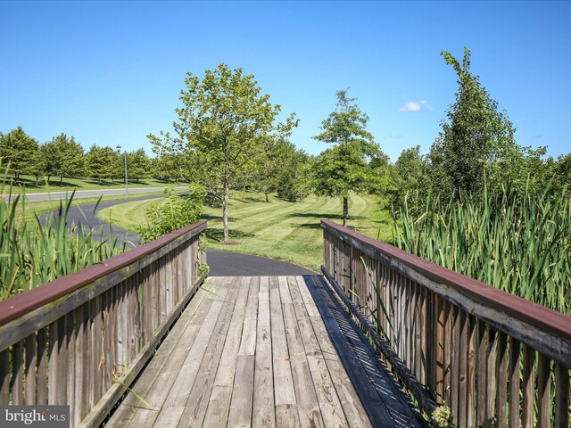 113 Heyford Dr, Stephenson, VA 22656 - deck featuring a lawn and view of scattered trees