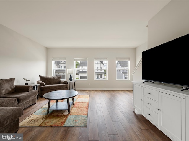 113 Heyford Dr, Stephenson, VA 22656 - living room with dark wood-type flooring and baseboards