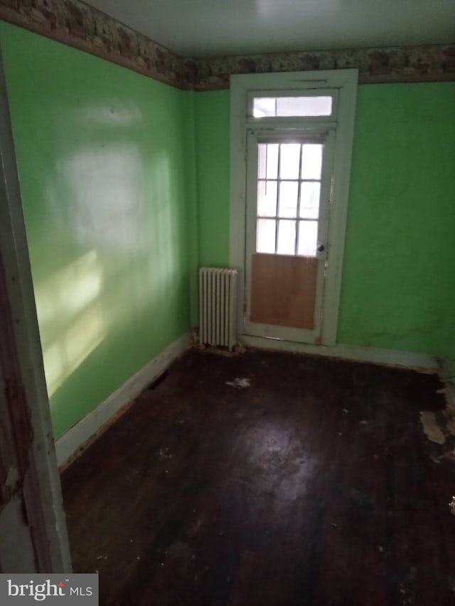 4417 Old York Rd, Baltimore, MD 21212 - empty room featuring radiator and baseboards