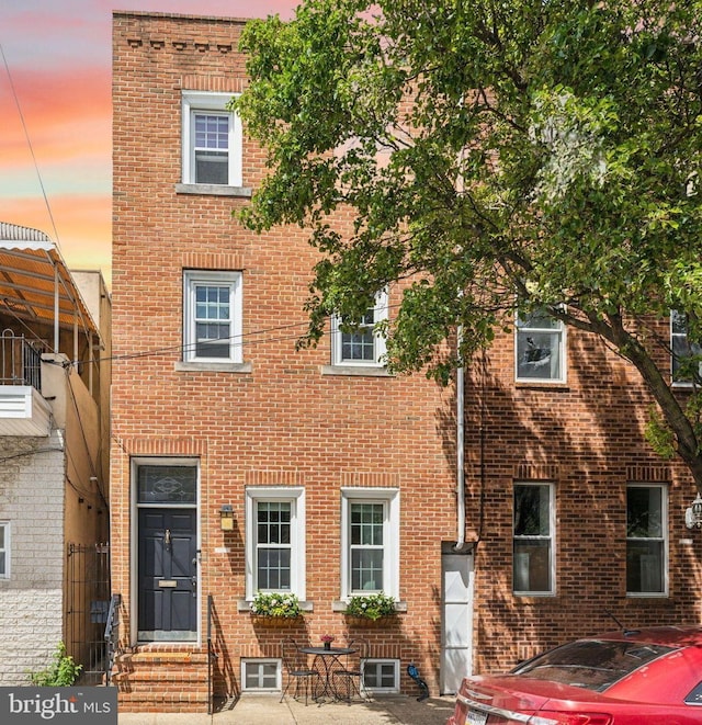 1011 Dickinson St, Philadelphia, PA 19147 - view of front of house featuring entry steps and brick siding