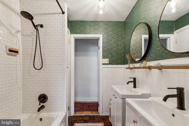 1011 Dickinson St, Philadelphia, PA 19147 - full bath with tub / shower combination, wallpapered walls, wainscoting, and two vanities