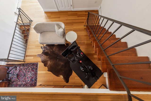 1011 Dickinson St, Philadelphia, PA 19147 - staircase featuring wood finished floors and baseboards