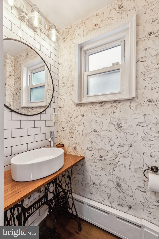 1011 Dickinson St, Philadelphia, PA 19147 - half bath featuring healthy amount of natural light and a sink
