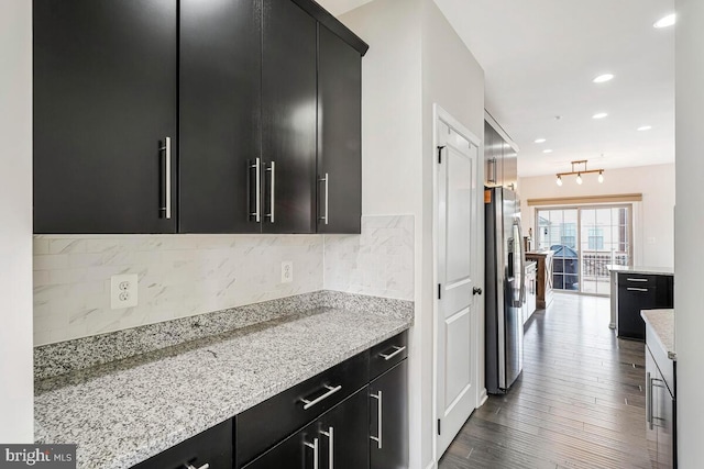 22635 Naugatuck Sq, Ashburn, VA 20148 - kitchen with dark cabinets, stainless steel fridge with ice dispenser, backsplash, dark wood-style floors, and recessed lighting