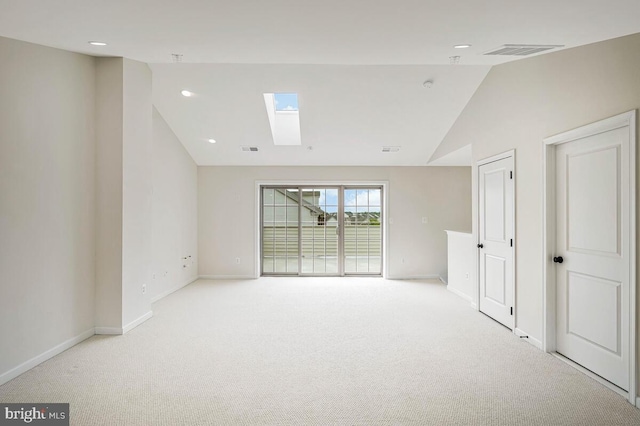 22635 Naugatuck Sq, Ashburn, VA 20148 - empty room with lofted ceiling, a skylight, baseboards, carpet floors, and recessed lighting