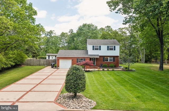2218 Oakwood Ln, Atco, NJ 08004 - colonial home featuring a garage, concrete driveway, brick siding, and view of wooded area