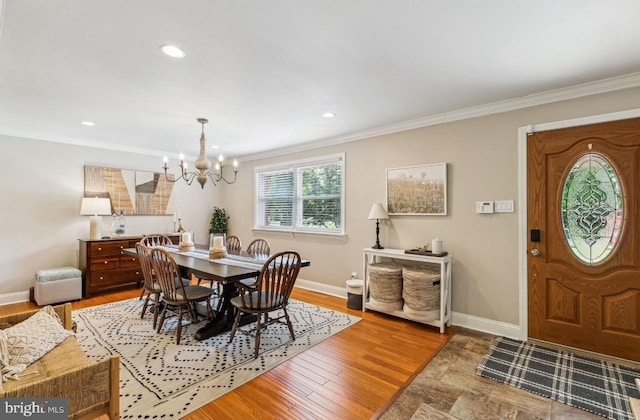 2218 Oakwood Ln, Atco, NJ 08004 - dining space featuring a chandelier, crown molding, baseboards, recessed lighting, and light wood finished floors