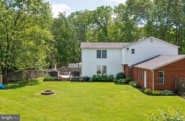 2218 Oakwood Ln, Atco, NJ 08004 - back of house with a fire pit and a wooden deck