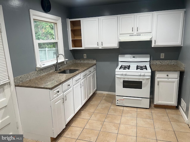 3403 Murdock Rd, Kensington, MD 20895 - kitchen featuring white gas stove, a sink, under cabinet range hood, and white cabinets