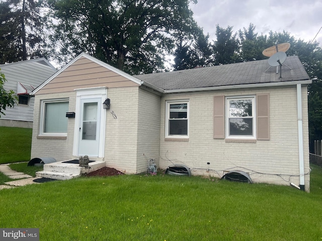 3403 Murdock Rd, Kensington, MD 20895 - bungalow-style home featuring brick siding, a front lawn, and a shingled roof