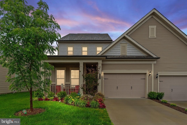 6411 Tulip Ter, Haymarket, VA 20169 - view of front facade featuring a porch, a front lawn, driveway, and a shingled roof