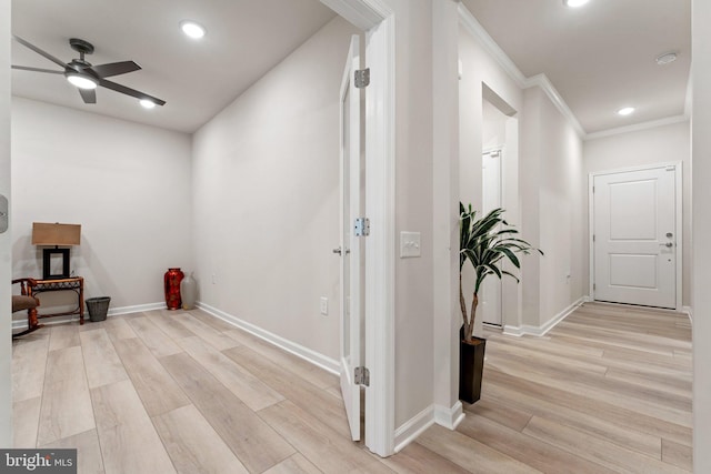 6411 Tulip Ter, Haymarket, VA 20169 - hall featuring crown molding, light wood-style flooring, baseboards, and recessed lighting