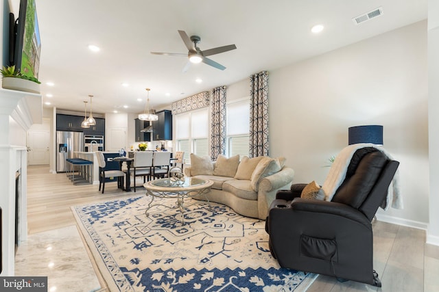 6411 Tulip Ter, Haymarket, VA 20169 - living room with a ceiling fan and recessed lighting
