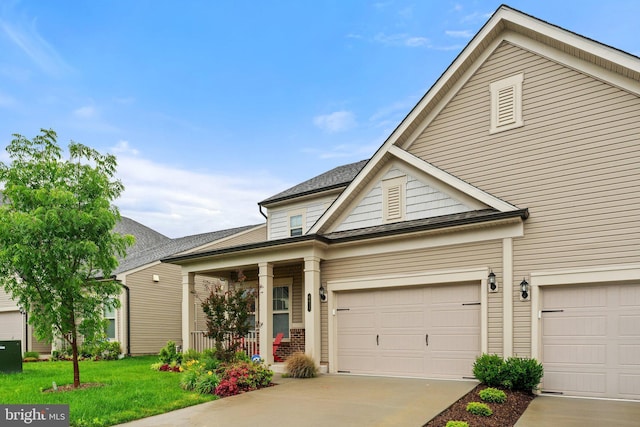 6411 Tulip Ter, Haymarket, VA 20169 - traditional-style home with covered porch, a front yard, concrete driveway, and roof with shingles