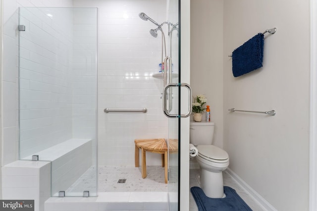 6411 Tulip Ter, Haymarket, VA 20169 - full bath featuring toilet, a stall shower, and baseboards