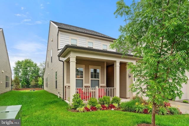 6411 Tulip Ter, Haymarket, VA 20169 - view of front facade with covered porch and a front lawn