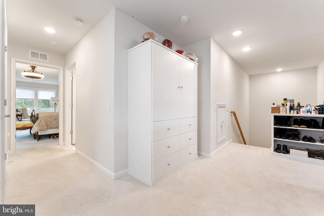 6411 Tulip Ter, Haymarket, VA 20169 - hallway featuring an upstairs landing, light colored carpet, baseboards, and recessed lighting