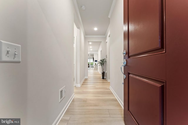 6411 Tulip Ter, Haymarket, VA 20169 - hall featuring ornamental molding, light wood-style floors, and baseboards