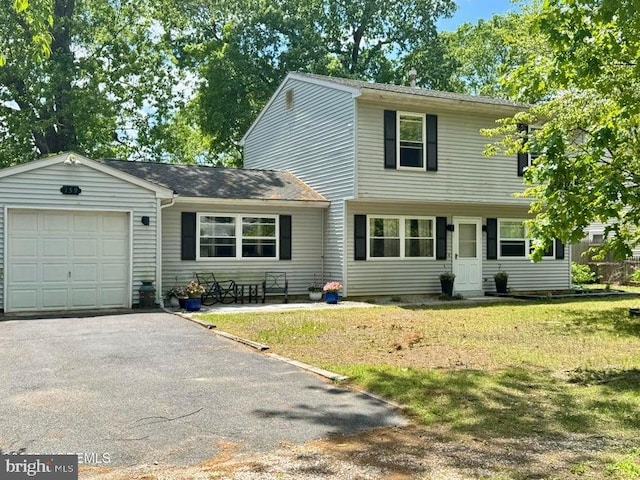 159 Harwich St, Browns Mills, NJ 08015 - view of front of property with a garage, a front lawn, and driveway