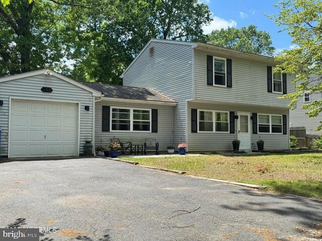 159 Harwich St, Browns Mills, NJ 08015 - view of front facade with an attached garage, a front lawn, and driveway