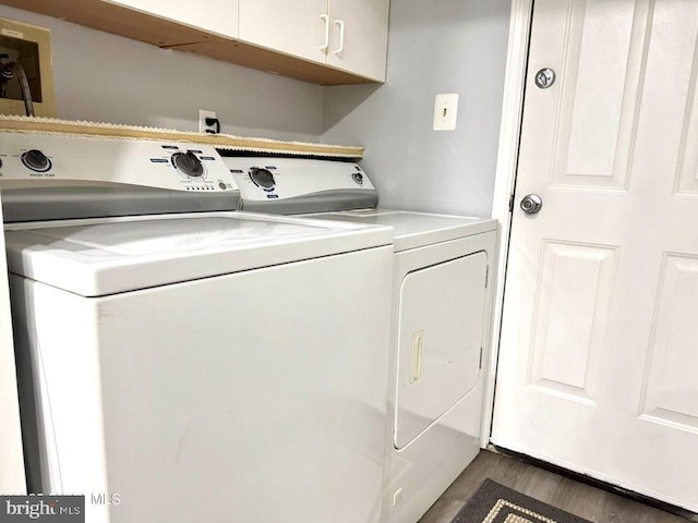 159 Harwich St, Browns Mills, NJ 08015 - washroom featuring cabinet space, independent washer and dryer, and dark wood-style floors
