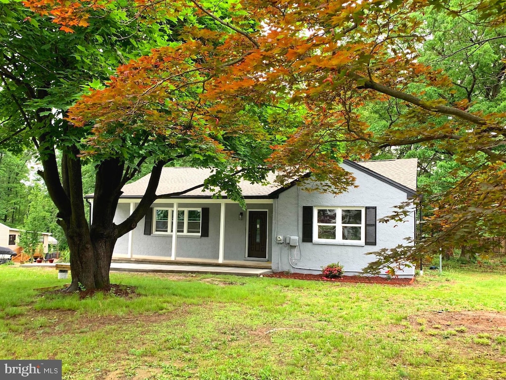 1117 Bush Rd, Abingdon, MD 21009 - single story home featuring stucco siding, a front lawn, and roof with shingles