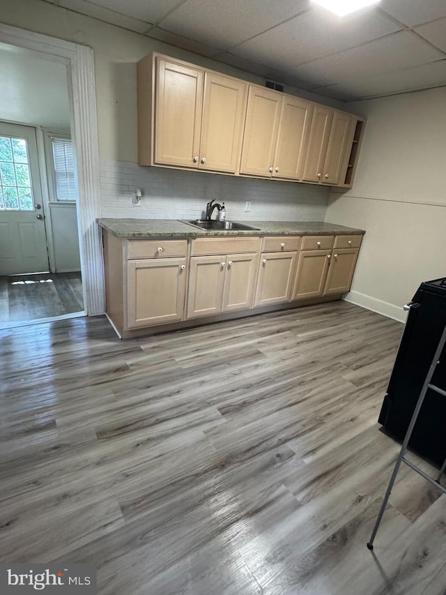 820 Cumberland St, Gloucester City, NJ 08030 - kitchen featuring a sink, a paneled ceiling, baseboards, light wood-style flooring, and black range oven