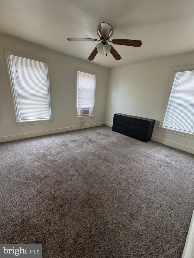 820 Cumberland St, Gloucester City, NJ 08030 - unfurnished living room with a ceiling fan, carpet flooring, baseboards, and cooling unit