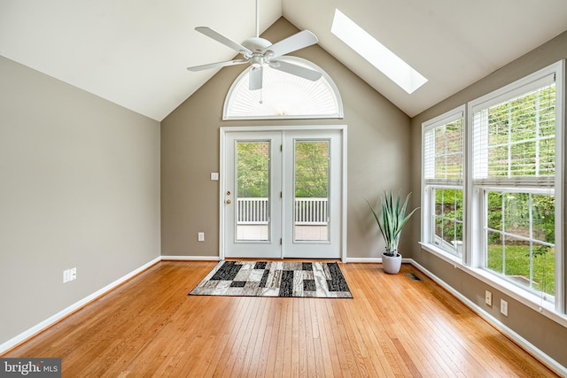 256 Silverbell Ct, West Chester, PA 19380 - entryway with a skylight, vaulted ceiling, healthy amount of natural light, hardwood / wood-style flooring, and a ceiling fan
