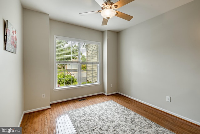 256 Silverbell Ct, West Chester, PA 19380 - spare room with wood-type flooring, baseboards, and ceiling fan