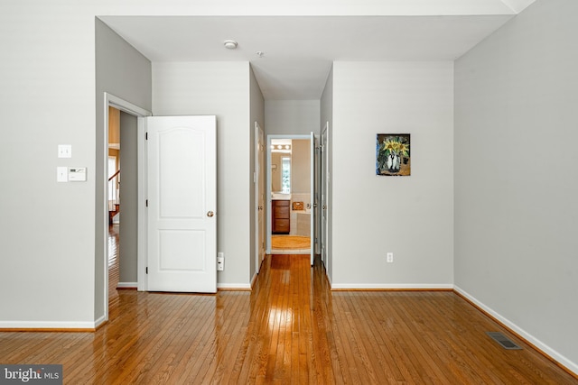 256 Silverbell Ct, West Chester, PA 19380 - unfurnished bedroom with hardwood / wood-style flooring, baseboards, and ensuite bath
