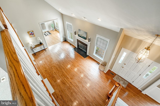256 Silverbell Ct, West Chester, PA 19380 - living room with wood finished floors, a premium fireplace, high vaulted ceiling, and baseboards