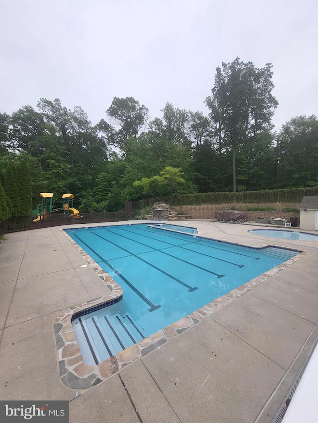 256 Silverbell Ct, West Chester, PA 19380 - community pool with a patio