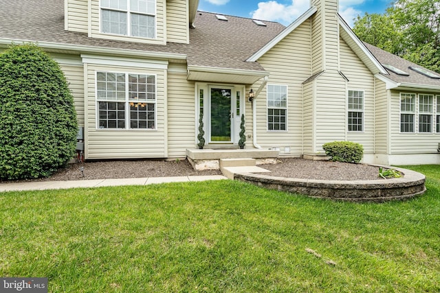256 Silverbell Ct, West Chester, PA 19380 - back of property featuring roof with shingles, a yard, and a chimney