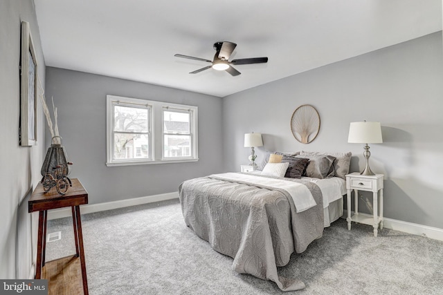 2503 W Forest Park Ave, Baltimore, MD 21215 - carpeted bedroom with baseboards and ceiling fan