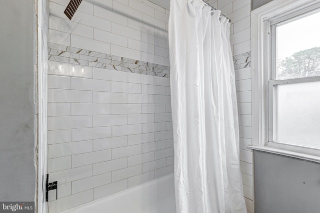 2503 W Forest Park Ave, Baltimore, MD 21215 - bathroom featuring shower / bath combo with shower curtain