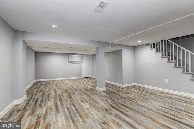 2503 W Forest Park Ave, Baltimore, MD 21215 - finished basement featuring wood finished floors, baseboards, recessed lighting, and stairs