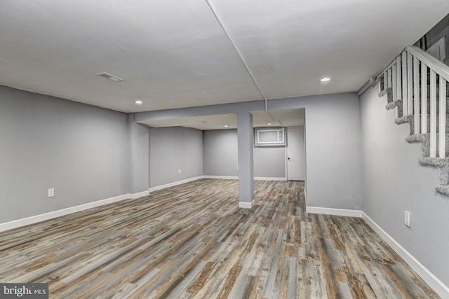 2503 W Forest Park Ave, Baltimore, MD 21215 - finished below grade area featuring wood finished floors, stairway, baseboards, and recessed lighting